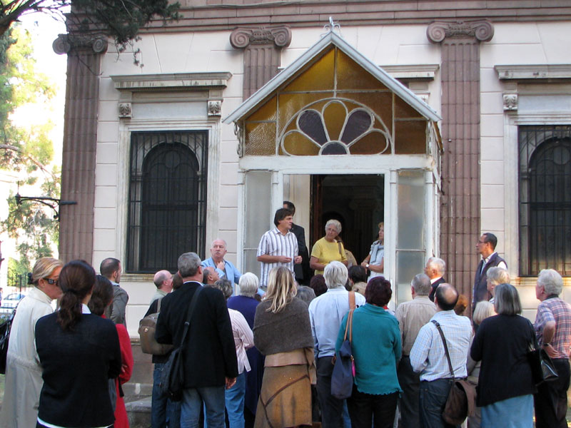 Brian Giraud welcoming guests on the steps of the Bornova Anglican Church